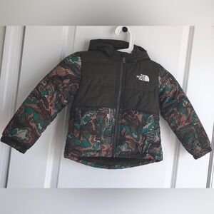 The North Face Kids' Camouflage Puffer Reversible Jacket.